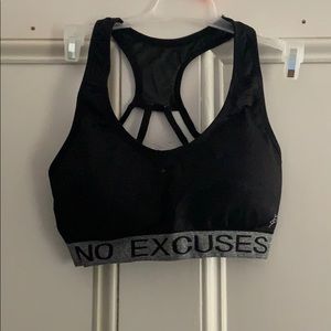 Black “No Excuses” sports bra